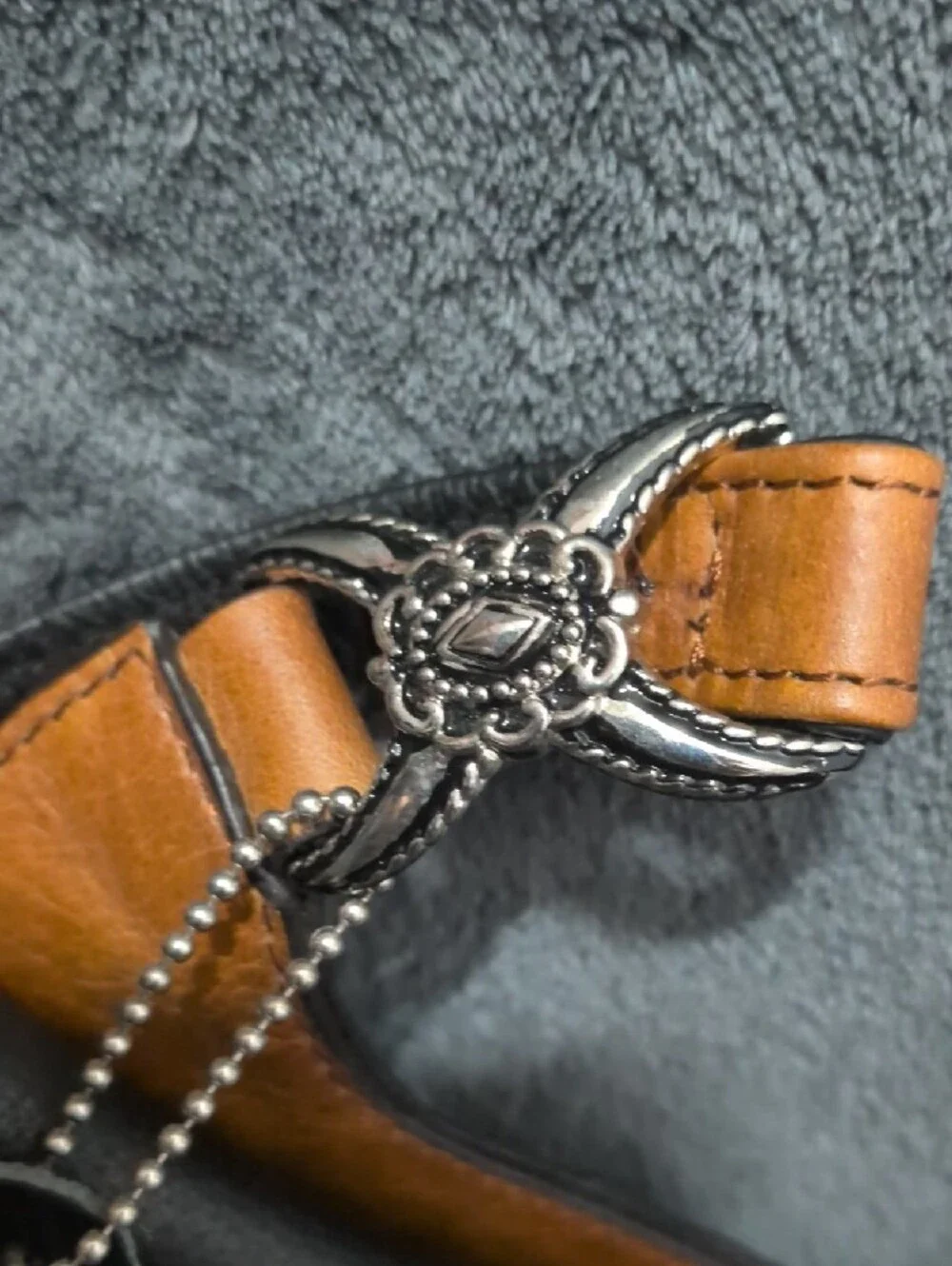 Black and Tan Leather Crossbody Bag with Concho Accent